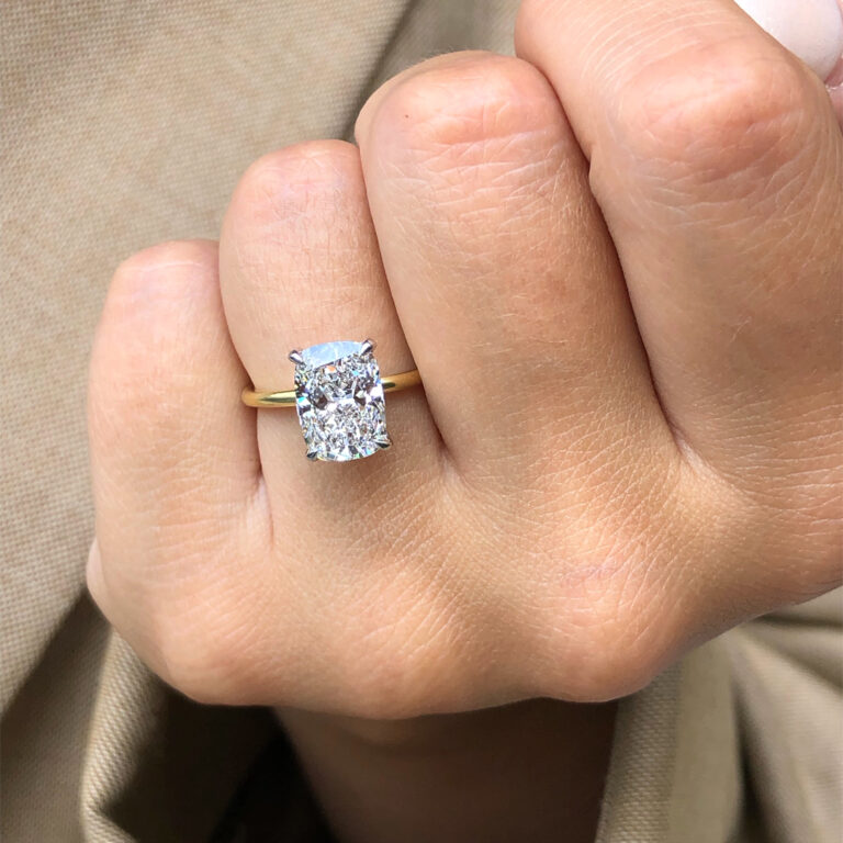 https://www.ascotdiamonds.com/wp-content/uploads/2022/09/3-carat-elongated-cushion-cut-diamond-solitaire-engagement-ring-in-yellow-gold-custom-made-by-ascot-diamonds-atlanta-768x768.jpg